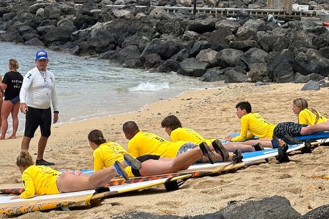 60 to 90 minutes Open Book Surfing Lesson with Certified Guide - The 90-minute flow: paddle, stand, then catch a ride