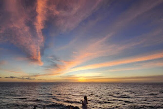 All-Inclusive Sunset Dolphin Watch and Snorkeling Cruise - Snorkeling Stop: Warm, Clear Water and Coral You Can Actually See