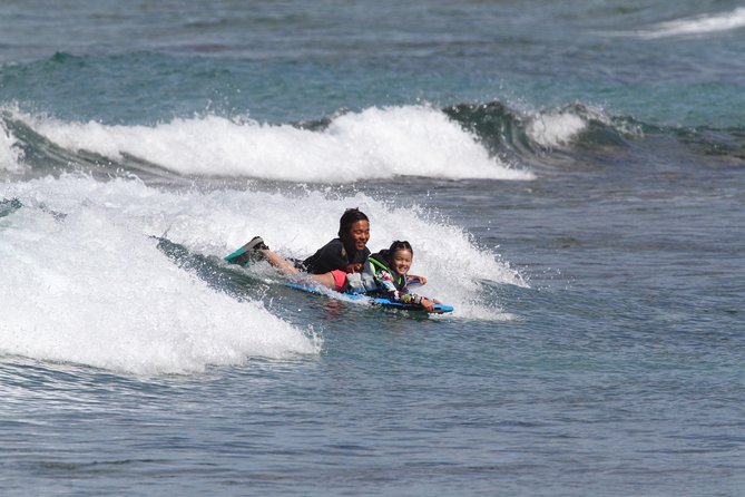 Bodyboarding 1-to-1 Private Lesson with Waikiki Courtesy Shuttle - When conditions change: trying surfing instead can be a win