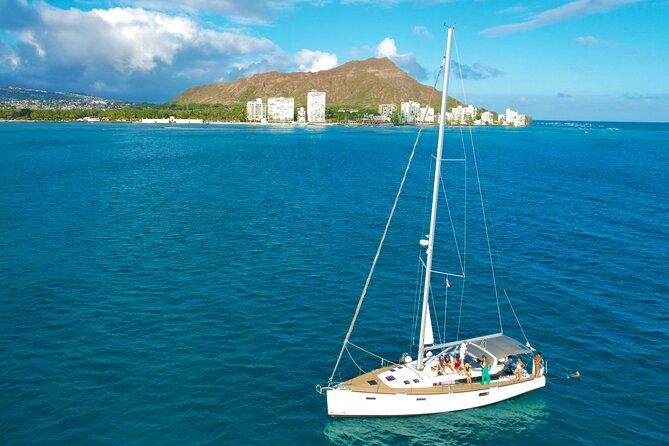 Explore Turtle Canyons Waikiki Snorkel and Sail Adventure - Private by Design: Families, Couples, and Solo Travelers