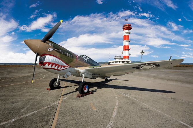Hangar Guided Tour - Hangar 79 Restoration Shop: bullet holes, repair work, and living history
