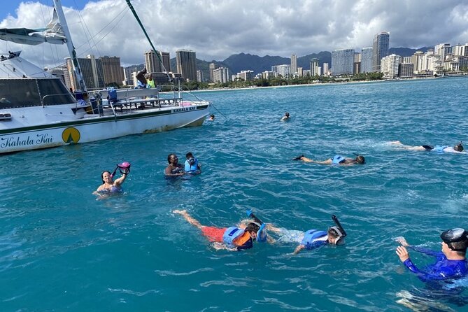 Oahu Catamaran Snorkel Tour: See Turtles 100% Guaranteed - Snorkeling gear and coaching: what it feels like in the water