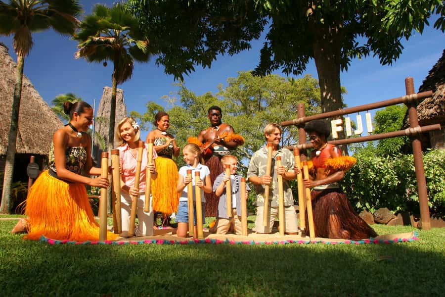 Oahu: Islands of Polynesia and "HA: Breath of Life Show" - Tahiti village: wedding ceremony moments, pole fishing, and hip-shaking dance