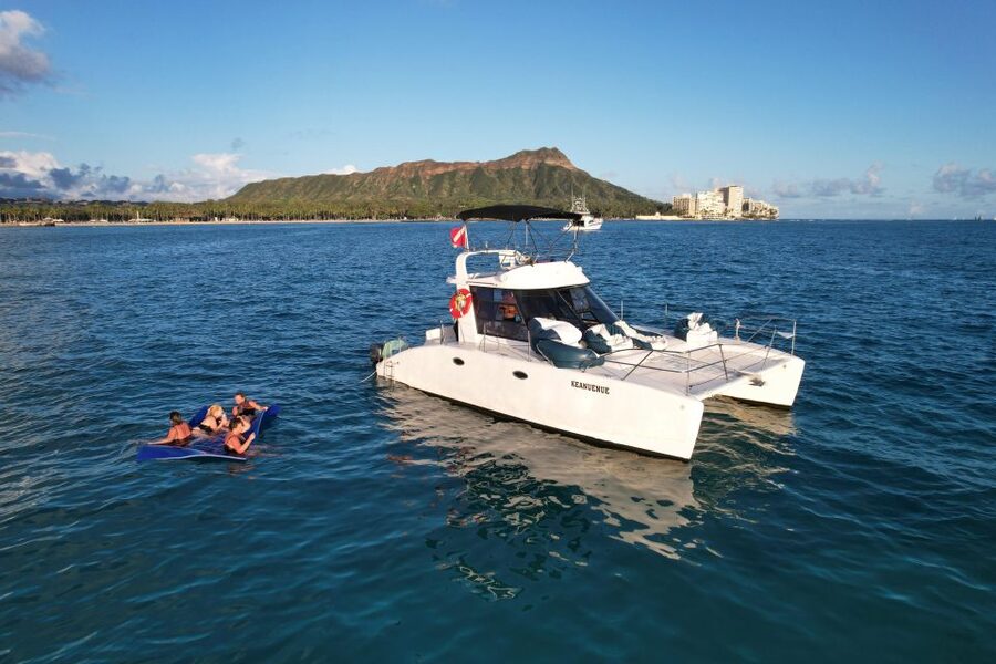 Oahu: Private Catamaran Sunset Cruise & Optional Snorkeling - What the crew and local guide actually do for you