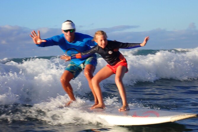 Private Kids Surfing Lessons - Boards, life jackets, and the supports that keep kids from quitting