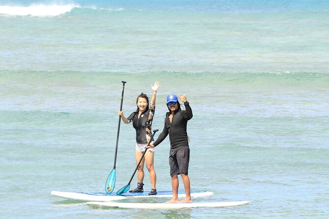 Stand Up Paddle Open Group Lesson with Waikiki Courtesy Shuttle - Gear Up for Real: Boards, Rash Guard, and Reef Shoes Included
