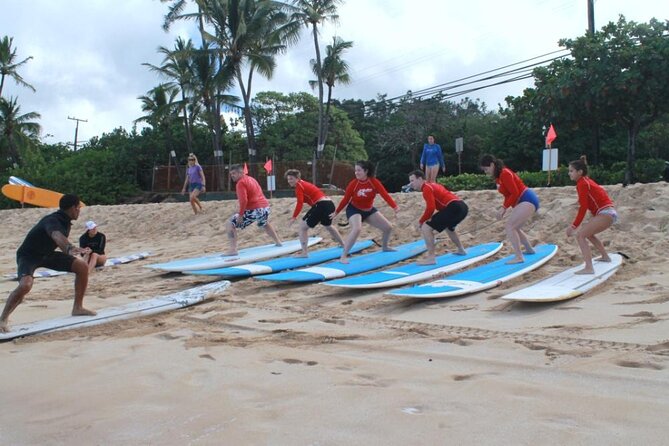 Surf Lessons on the North Shore Great for Families and all Ages - Your $165 value: board, rashguard, and coaching that’s built for results