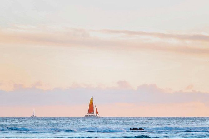Waikiki Sunset Cocktail Sail with Open Bar - Holokai Catamaran vibe: social, not stuffy, 49 people max