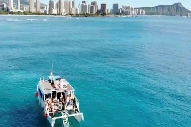 Waikiki Turtle Canyon Snorkeling Adventure - On the water: shade, snacks, and a crew that teaches fast